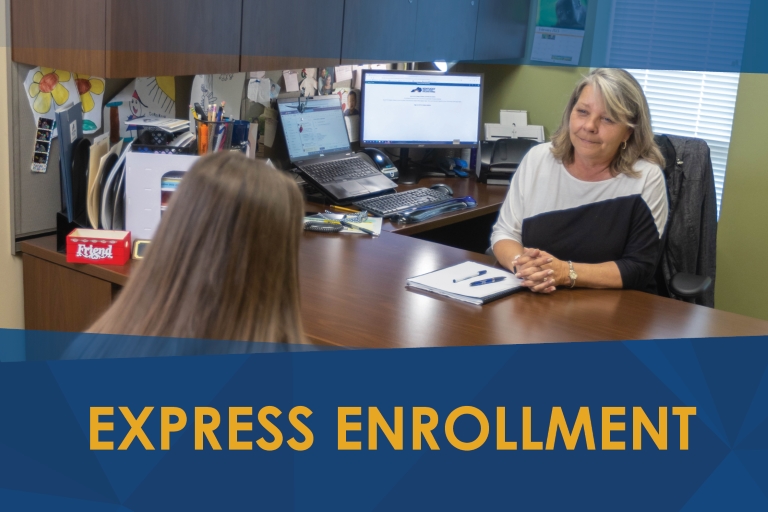 Express Enrollment: student and advisor in an office talking